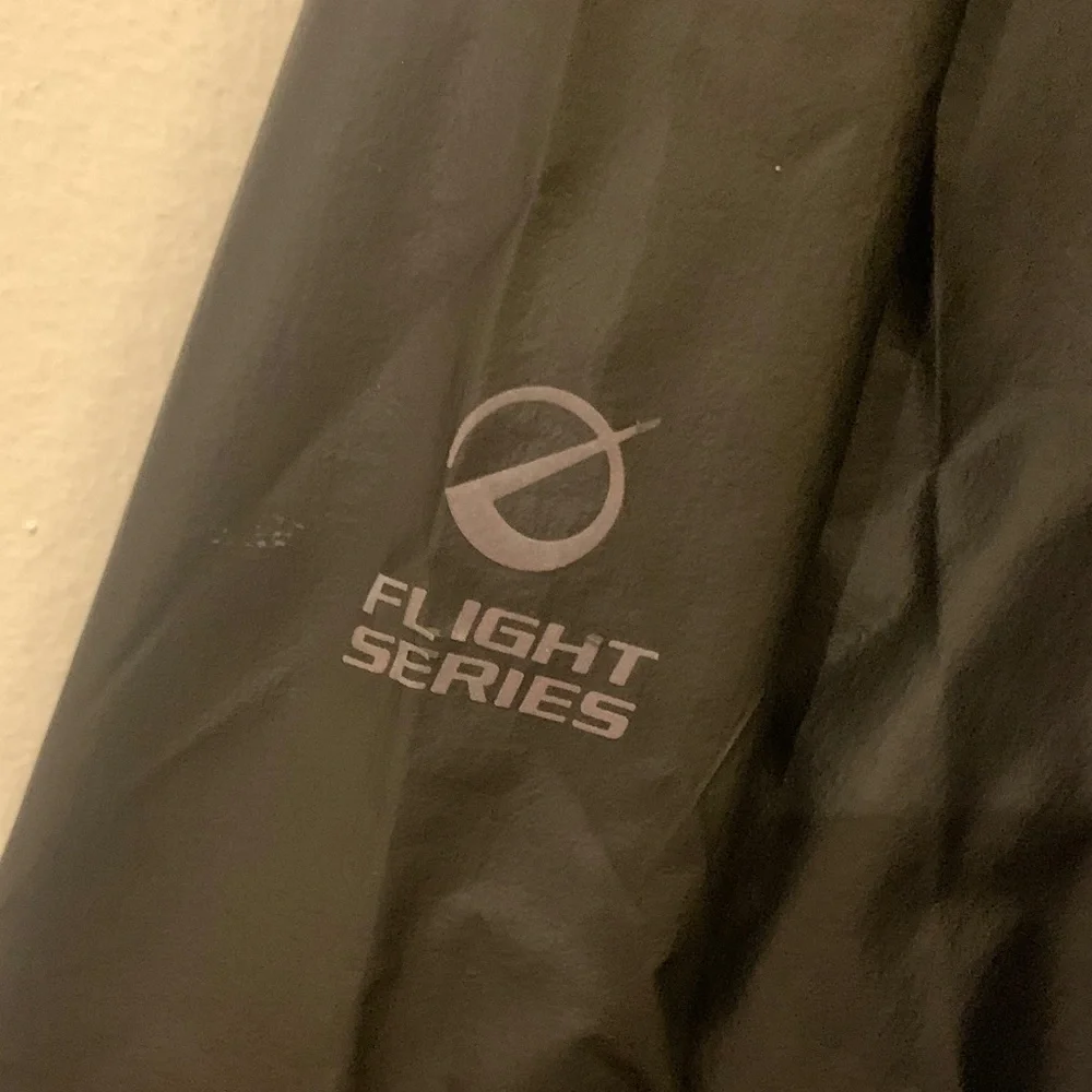 The North Face Men's Black Raincoat with Bright Yellow Zipper